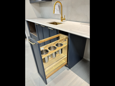 Wet bar: Blue, Counter top: 9 Ft.wide, 26’’deep, Retail value: $30,223.. Sale Price: $12,500 + Tax.. Includes: Cabinets, Quartz counter tops, Handles, Sink, Floating shelf’s, Cabinets accessories. Does not include: Removal from show room or  Installation. 