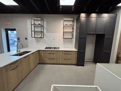 Display Kitchen: Oak and Black, Counter top: 125’’wide 26’’deep, peninsula: 93 ¼’’wide 39’’deep,  Pantry: 70 ¾’’wide 110’’tall, Fridge: 36’’wide,  Retail Value: $29,240..  Sale Price: $16,000 + Tax..  Includes: Cabinets, Quartz counter tops, Handles, Sink, Cook top, Cabinets accessories. Does not include: Removal from show room, Installation, Aluminum shelf system.