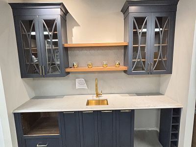Wet bar: Blue, Counter top: 9 Ft.wide, 26’’deep, Retail value: $30,223.. Sale Price: $12,500 + Tax.. Includes: Cabinets, Quartz counter tops, Handles, Sink, Floating shelf’s, Cabinets accessories. Does not include: Removal from show room or  Installation. 